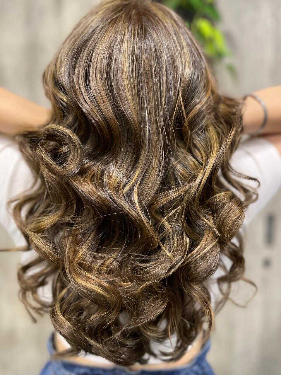 Hair Styling and Curling at Bellissimo Nail Studio & Salon