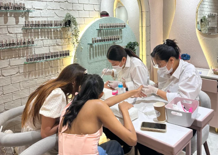 Bellissimo Nail Studio - Clients Relaxing During Manicures and Pedicures in Mumbai